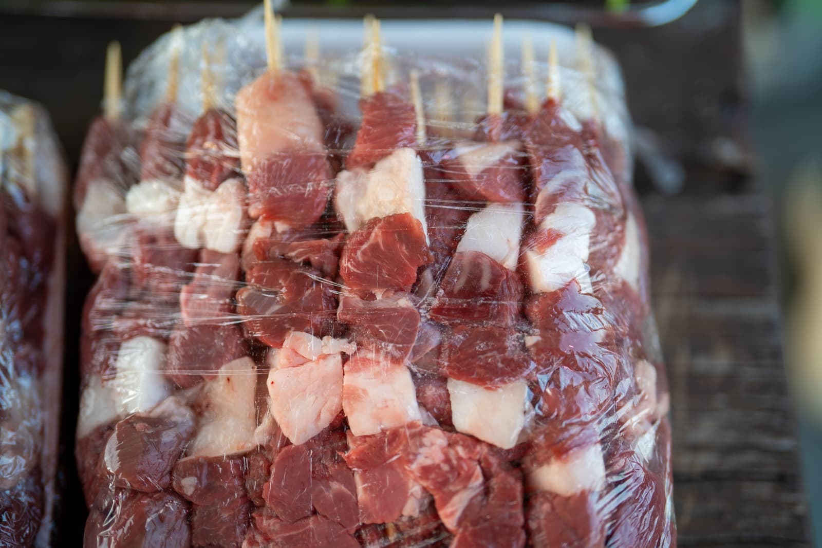 Fresh meat wrapped tight in clear plastic